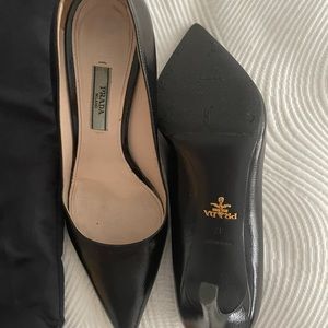 Black Prada Pumps Size 37, hardly worn! Rubber sole added, great condition!